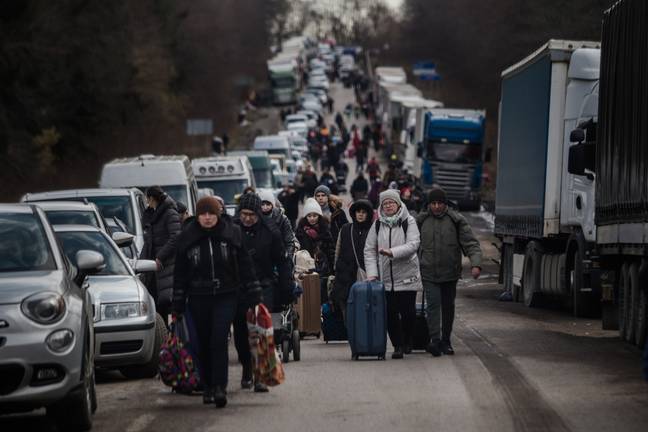 Thousands make their way to the Medyka border. Image credit: Wojciech Grzedzinski/Getty Images