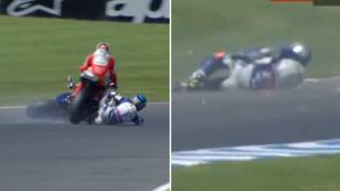 Fans furious at MotoGP officials after driver is run over and left helpless on track